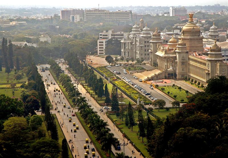 Traffic moves along a road in the southern Indian city of Bangalore December 14, 2005. Bangalore, lo..